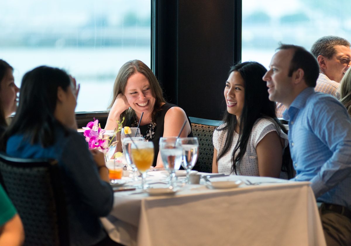 People Smiling at a Table at Easter Premier Brunch Cruise at Navy Pier
