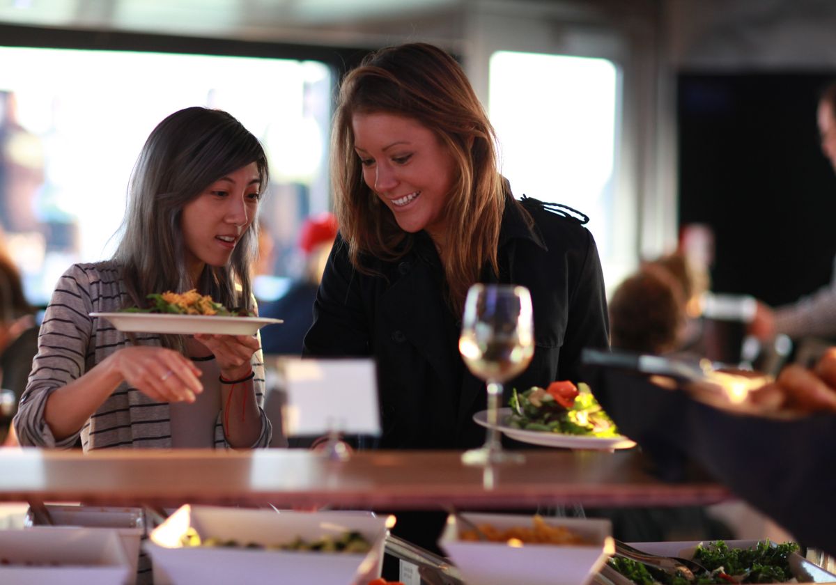 Women Grabbing Food at Mother's Day Signature Afternoon Brunch at Navy Pier