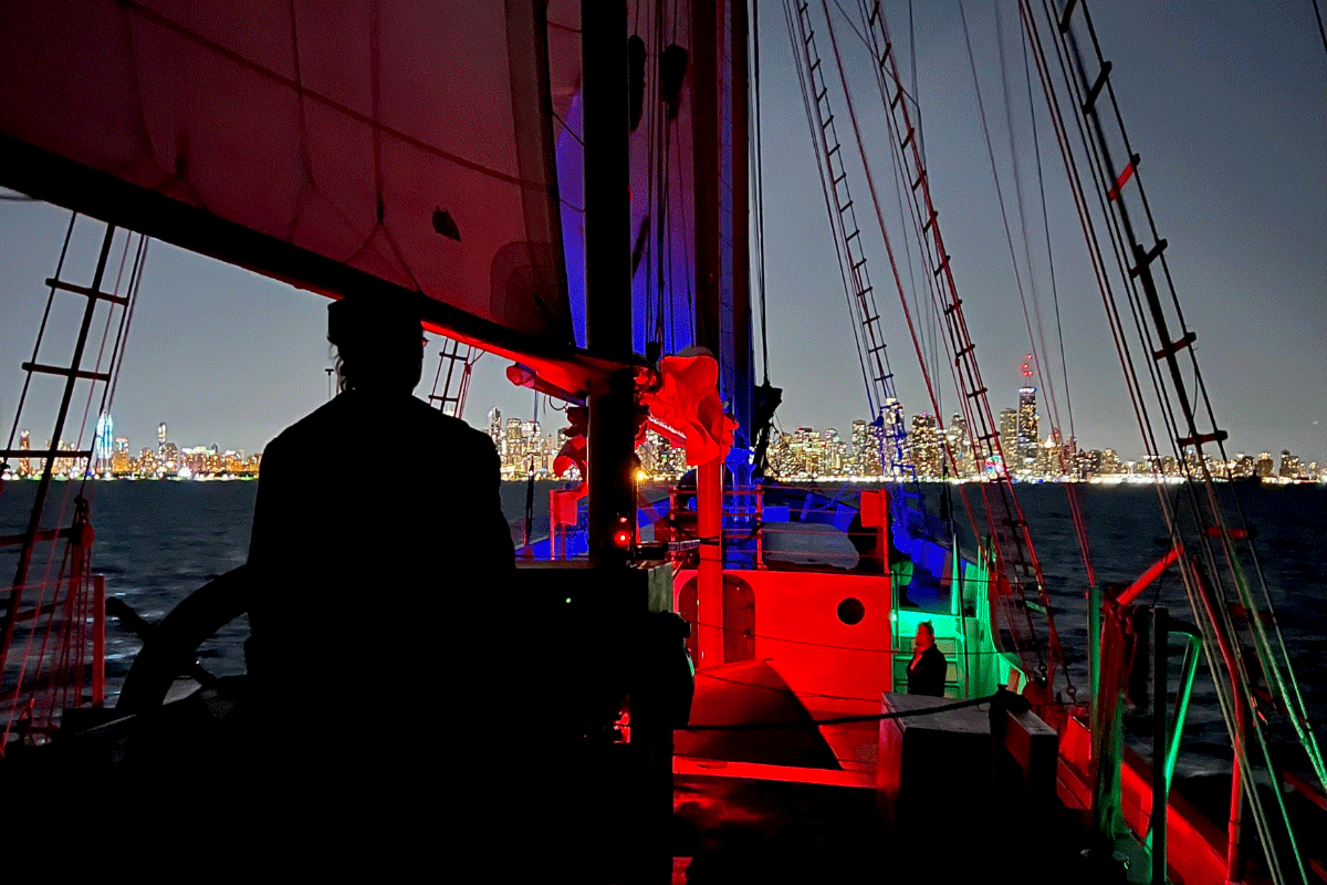 Man at Helm of Tall Ship Windy at Navy Pier