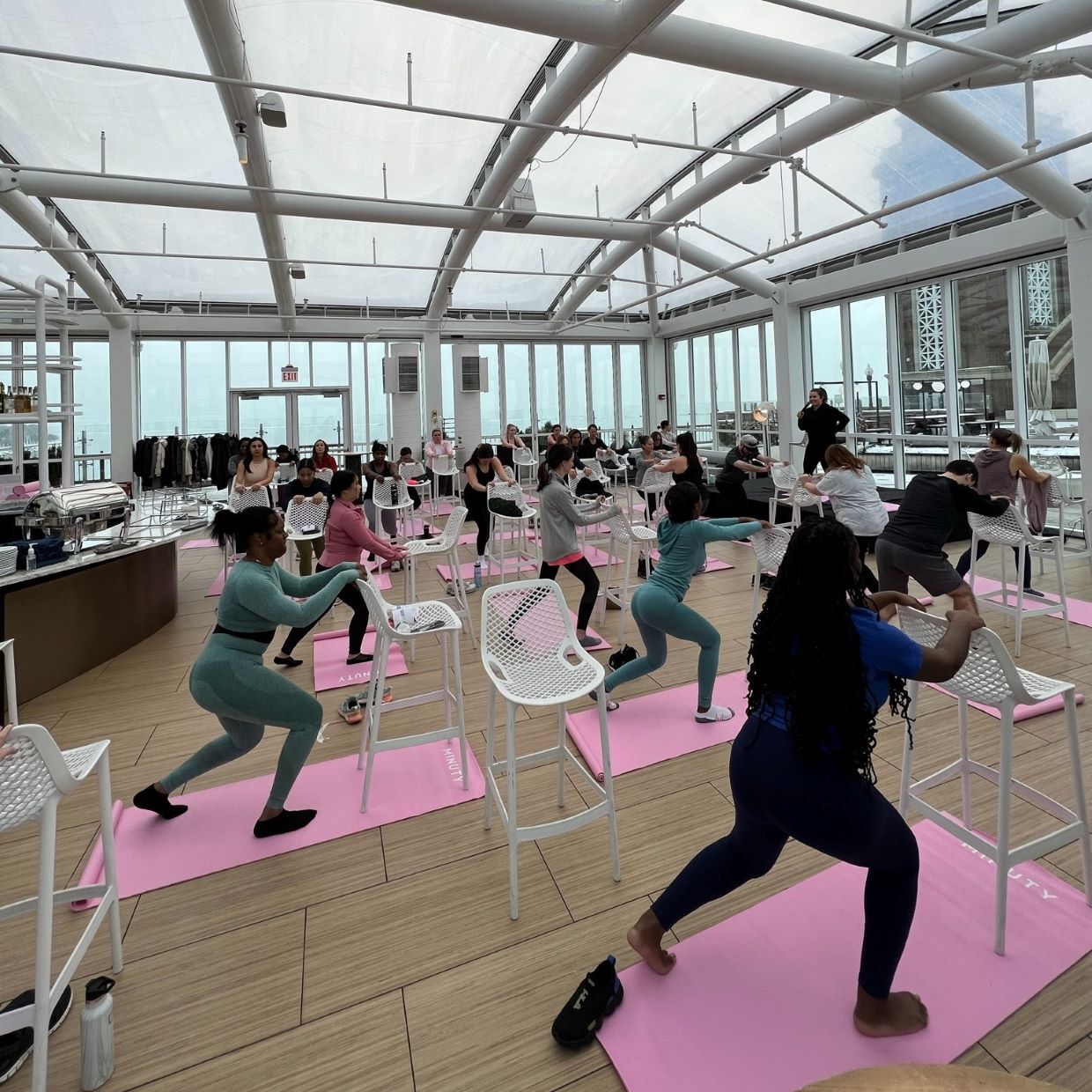 Navy Pier's Offshore Rooftop Wellness on Water Women in Yoga Class
