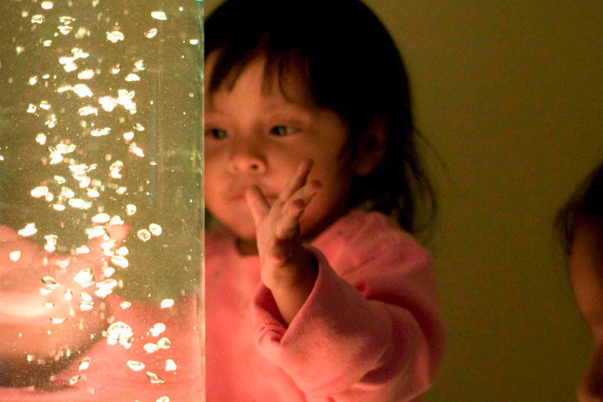 Play For All At Chicago Children's Museum Little Girl Looking At Bright Lights