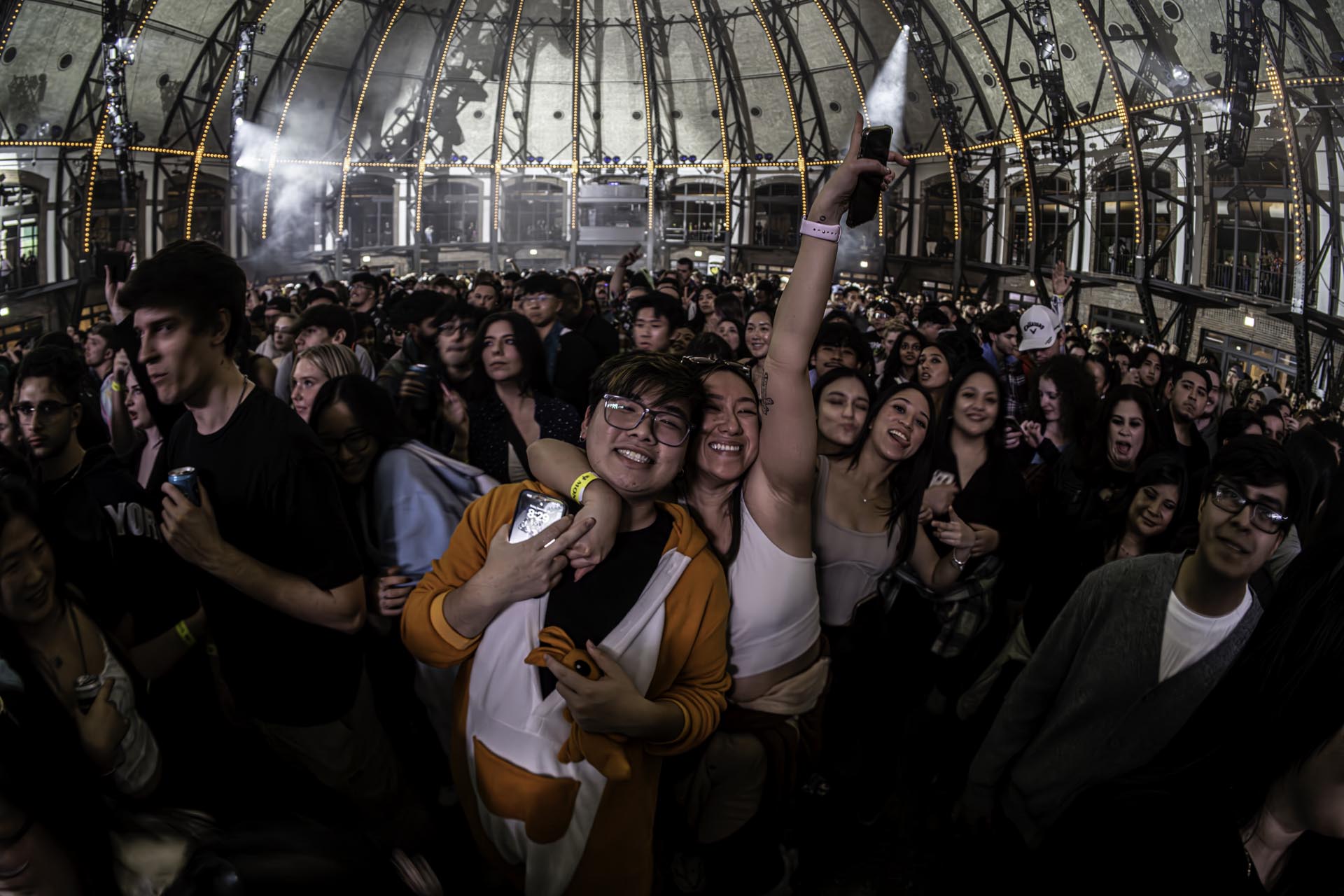 Fans celebrate at Navy Pier during The Chainsmokers concert in Aon Grand Ballroom
