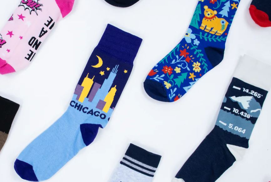 colorful Chicago-themed socks featuring skyline and floral designs