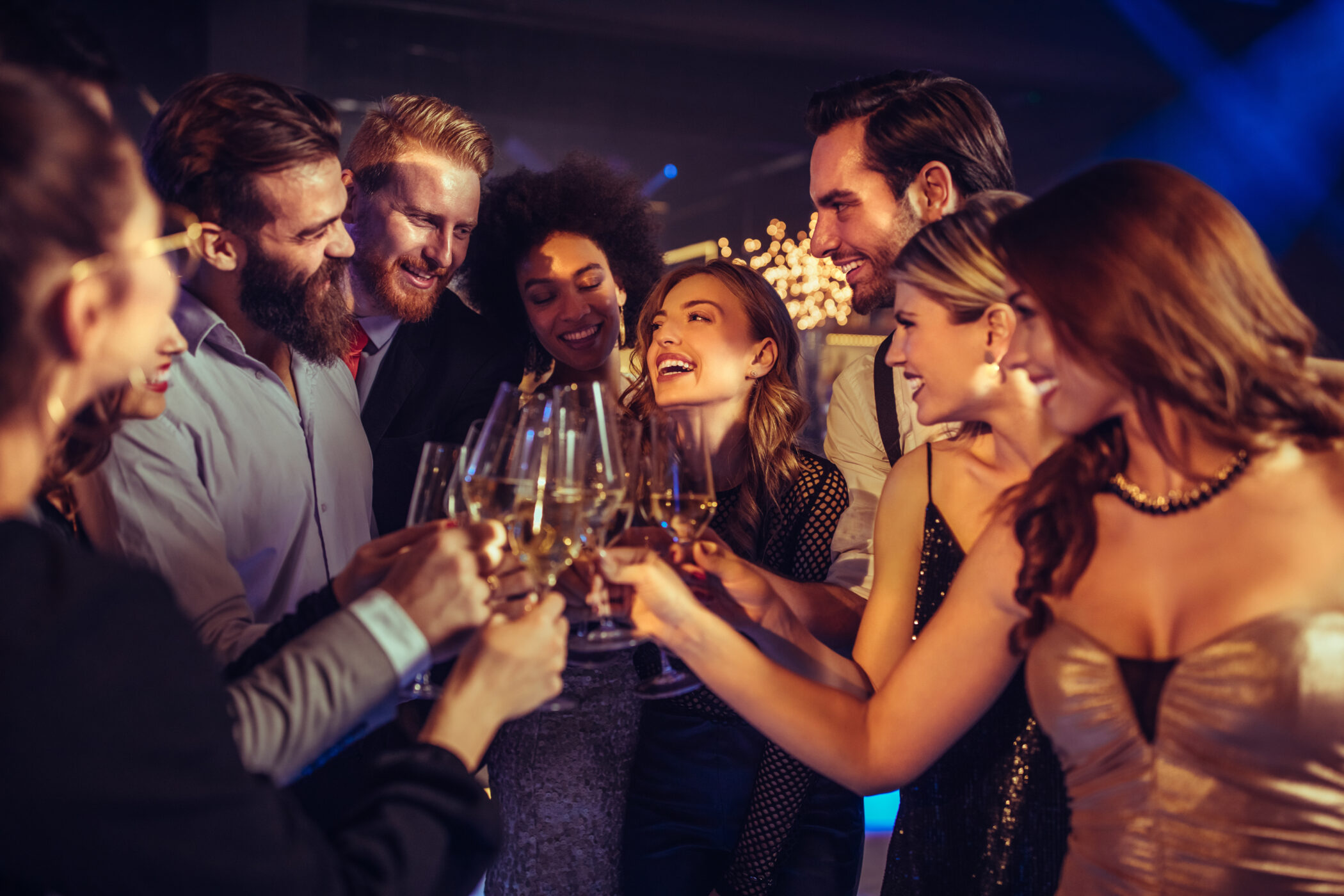 Happy,Young,Drinking,Champagne,In,The,Nightclub