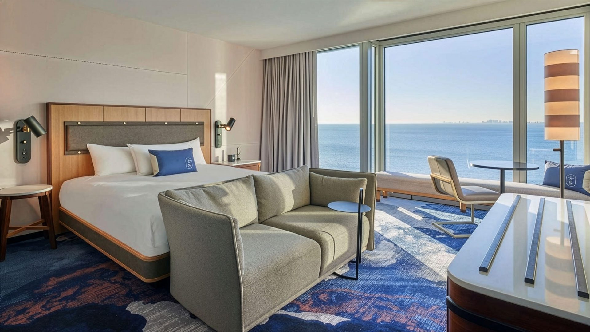 Bright hotel room with large windows and lake view at Sable at Navy Pier