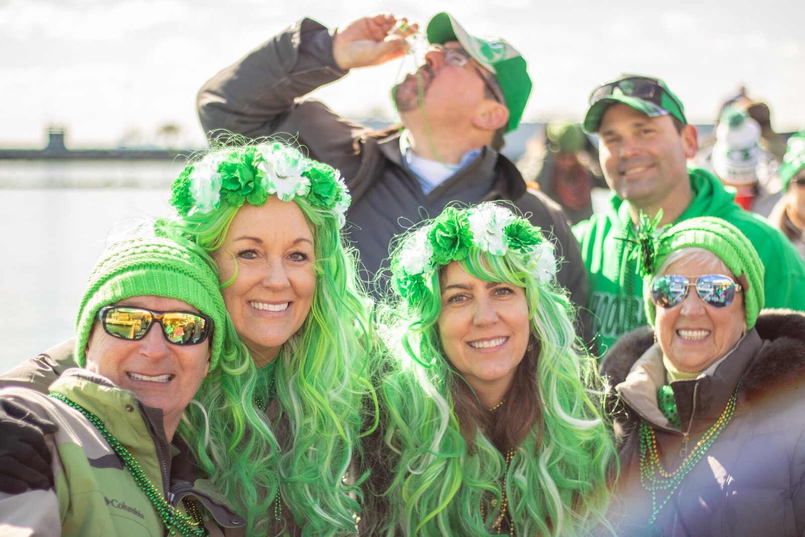 Group of people in green attire celebrating St. Patrick's Day Navy Pier