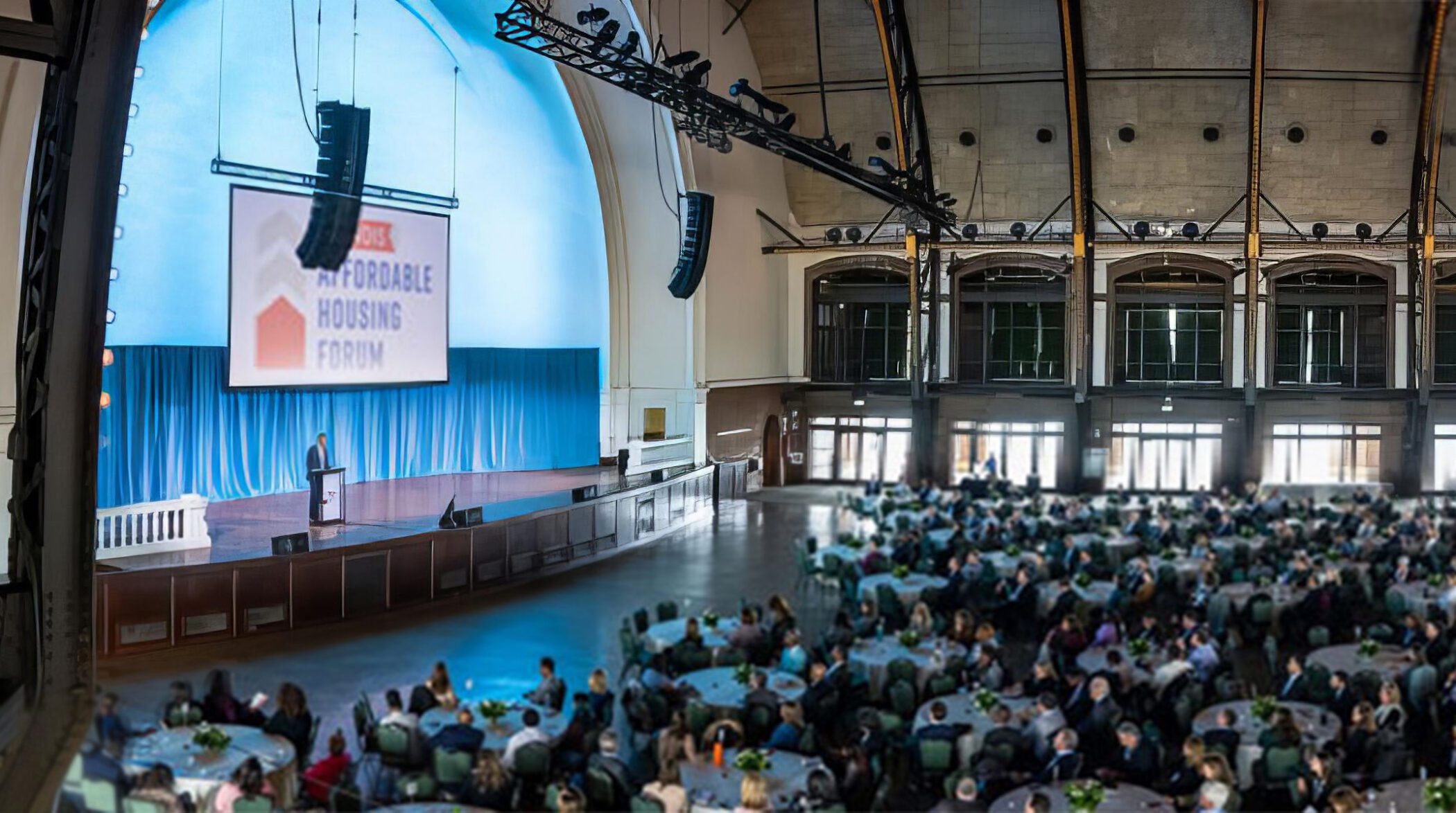 Panel speakers on stage at the Illinois Affordable Housing Forum at Navy Pier