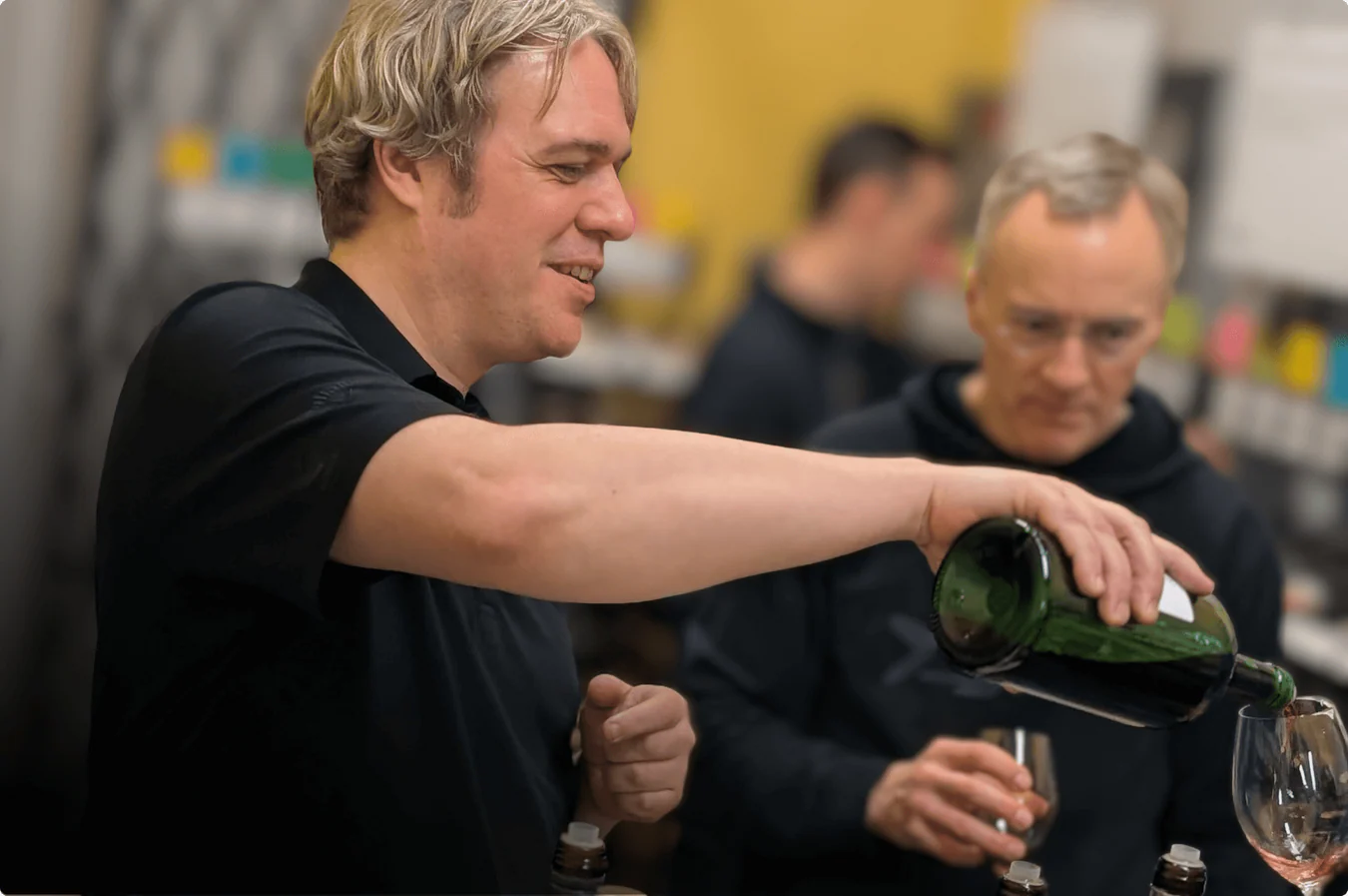 Sommelier pouring red wine for guests at a Navy Pier tasting event