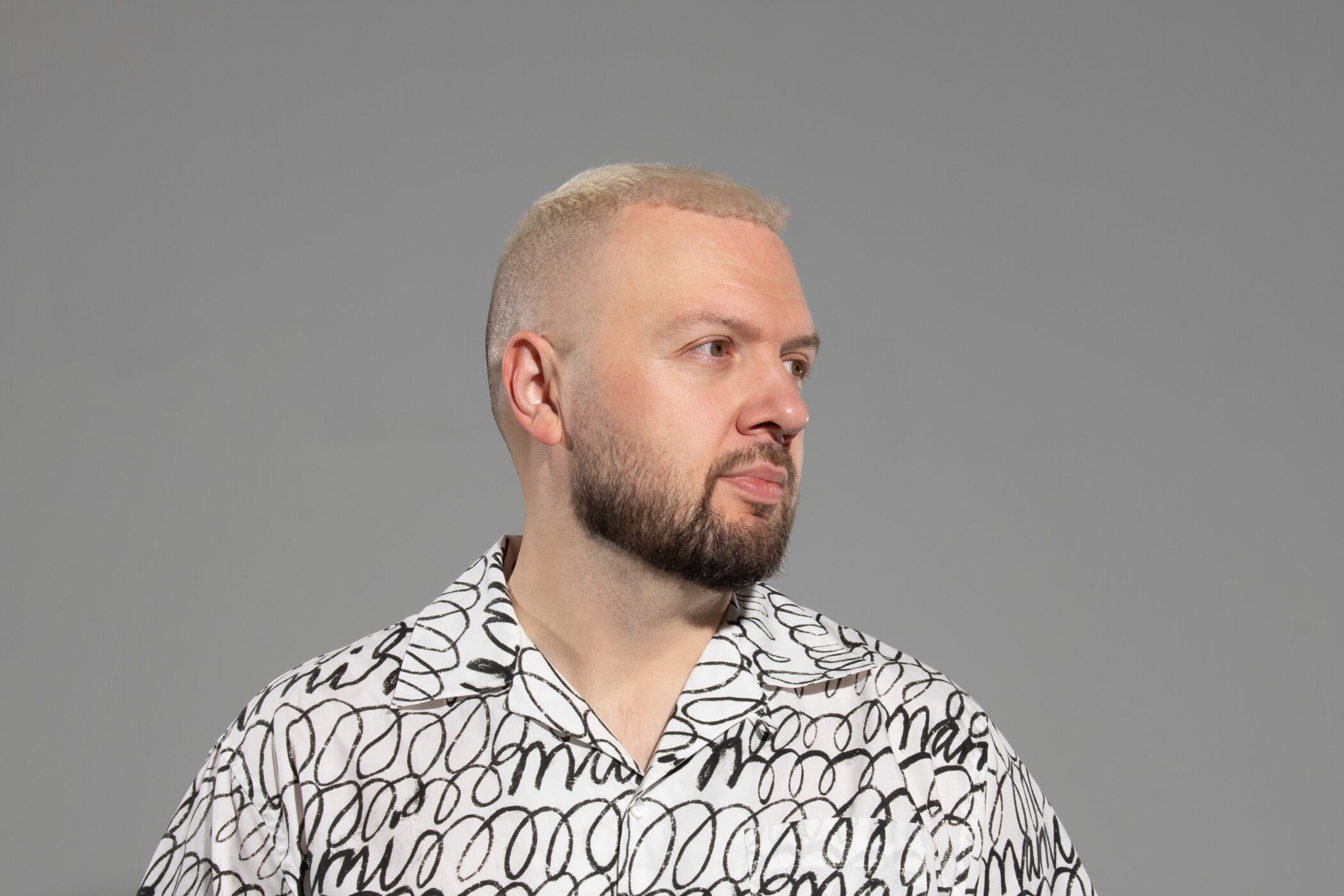 Chris Lake press photo showing him in a patterned shirt