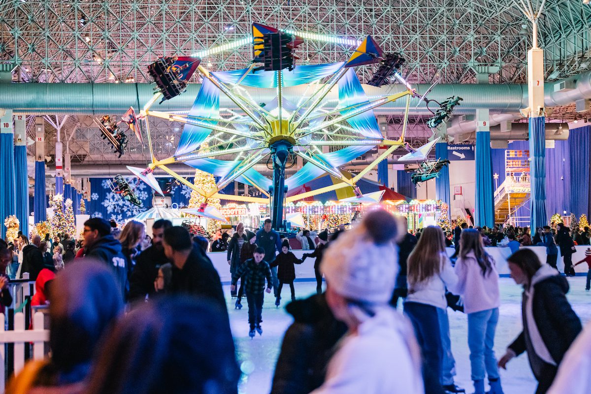 Visitors ice skating inside Winter WonderFest at Navy Pier.