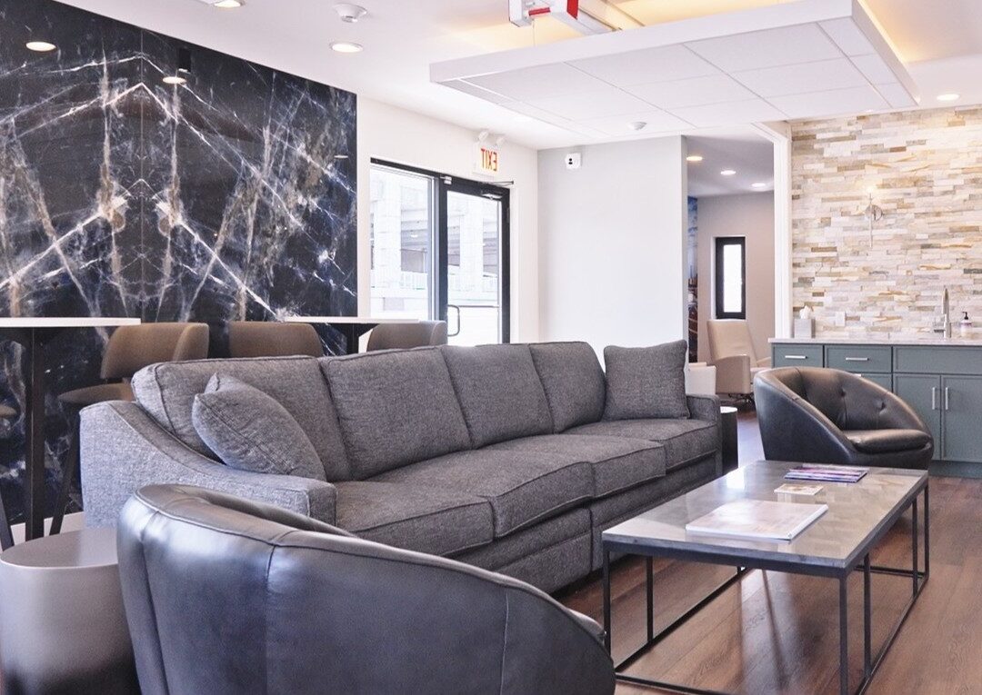 Marina lounge at Navy Pier with a gray sectional sofa and coffee table