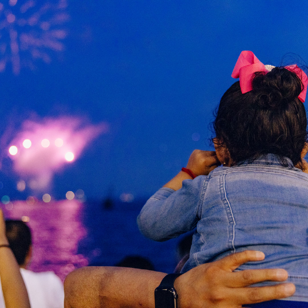 Child watches a firework event at Navy Pier
