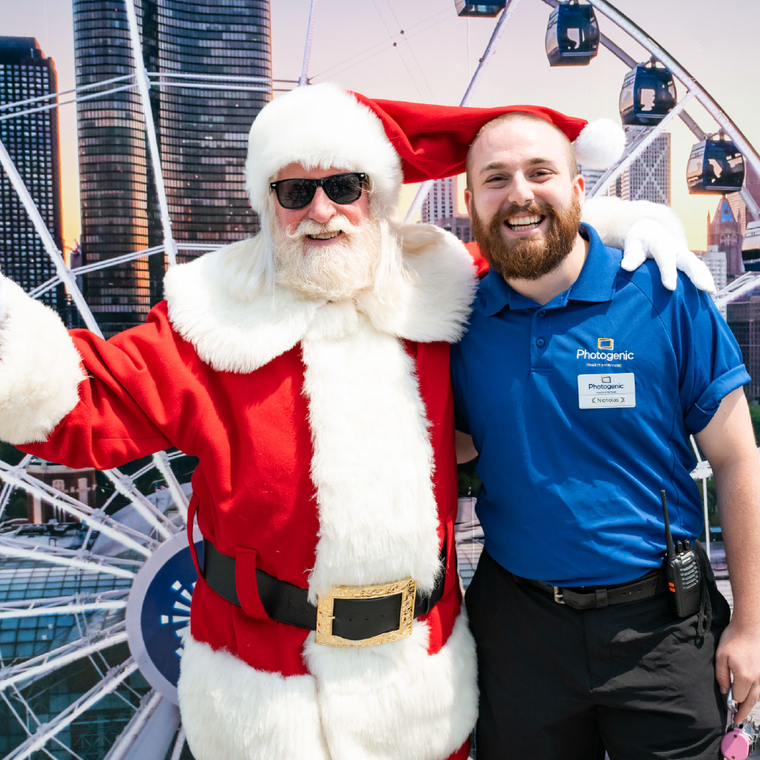 Man poses with Santa and an Christmas event at Navy Pier