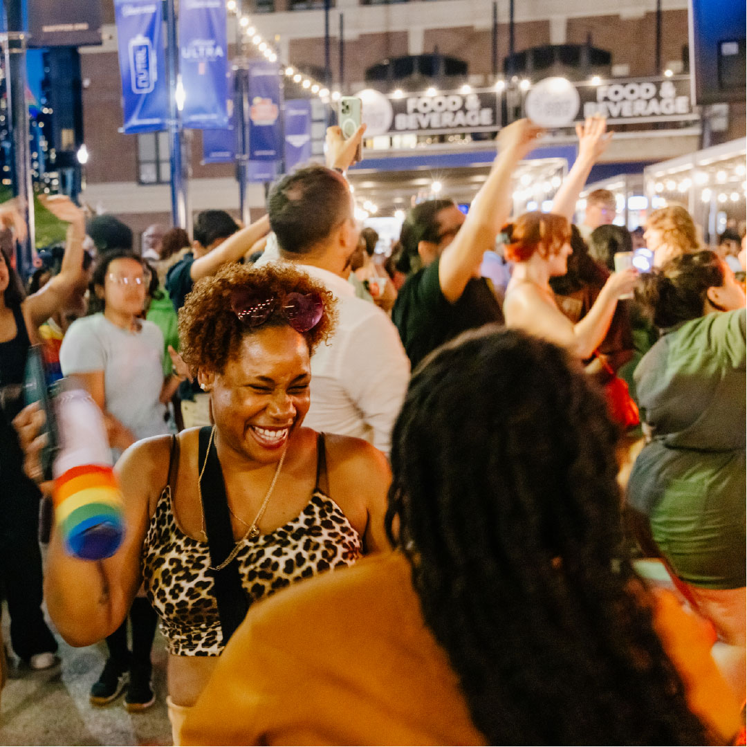 Crowd of people dancing at an event at Navy Pier