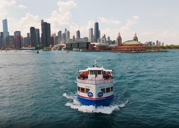 Shoreline Sightseeing boat cruising past Navy Pier and the skyline
